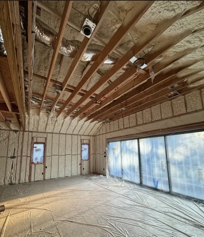 Interior walls and ceiling insulated with spray foam during new construction in Jackson